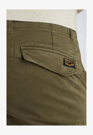Olive green cotton cargo pants with a patch pocket on the back, featuring a black and yellow brand label stitched on the pocket.
