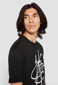 HUGO Marškinėliai su spaudiniu - black