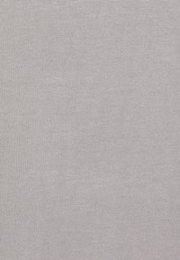 Light gray fabric with a smooth texture, featuring a consistent ribbed pattern throughout, suitable for various textile applications.