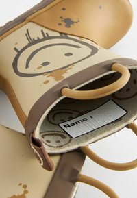 Next PANDA HANDLE - Bottes en caoutchouc - yellow smiley