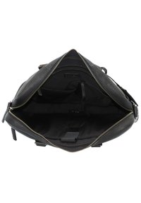 Schwarze Lederhandtasche mit Reißverschluss, ausgestattet mit einem geräumigen Innenraum aus schwarzem Stoff, mehreren Taschen und einer glatten Textur.
