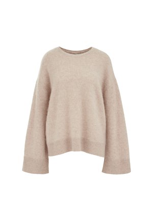 Beige oversized sweater met een zachte, gestructureerde afwerking, ronde halslijn en brede mouwen. Ribbelboord aan de onderkant en manchetten voegen detail toe.