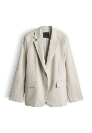 Beiger Blazer mit einem Knopf, Revers mit Kerbe, zwei vorderen Pattentaschen, langen Ärmeln und einem schwarzen Innenetikett.