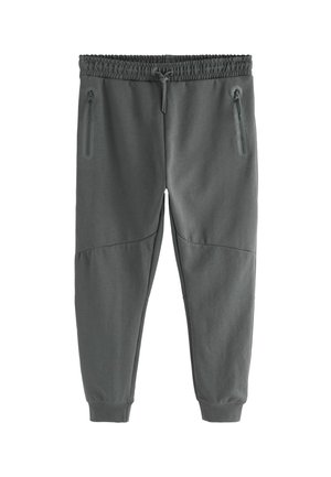 Gray sweatpants with a textured finish, elastic waistband, drawstring, and two zippered side pockets. Fitted cuffs at the ankles.