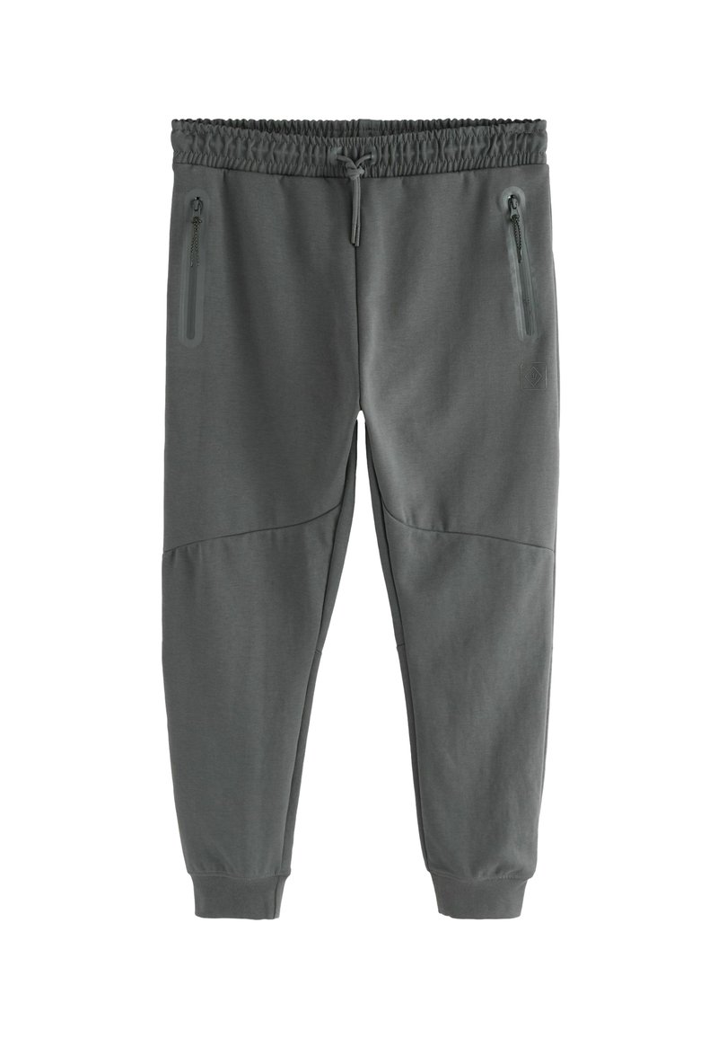 Grå sweatpants med tekstureret finish, elastisk talje, snoretræk og to lynlåslommer på siderne. Tætsiddende manchetter ved anklerne.