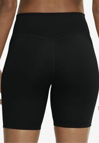 Pantaloni corti neri a vita alta con una superficie liscia e un design aderente. Presentano una vita e un orlo senza cuciture, adatti per l'abbigliamento attivo.