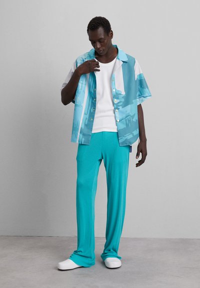 Nikolaj Storm KOS PANTS - Pantalon classique - atlantis