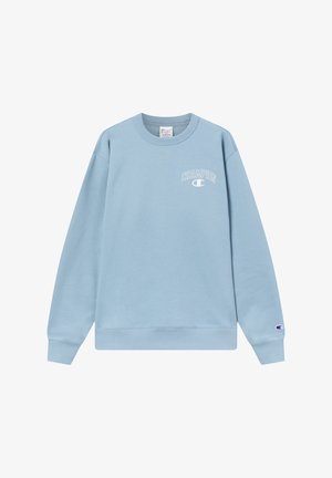 Sudadera azul clara de algodón, con cuello redondo, mangas largas y un pequeño logo "CHAMPION" en el pecho. Corte clásico.