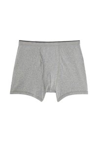 Grå bomullsboxershorts med svart midjeband, med en frontöppning och sydda sömmar. Tyget ser mjukt och flexibelt ut.