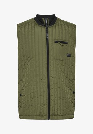Olivovozelená bezrukávová vesta s prešívaným vzorom, so zipsom vpredu, bočnými vreckami a malým vreckom na hrudi so zipsom. Čierny lem na výstrihu.