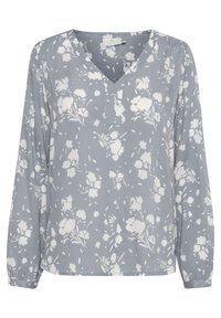 Blusa grigia chiara con stampa floreale bianca, scollatura a V, maniche lunghe con polsini arricciati e vestibilità rilassata. Tessuto morbido e testurizzato.