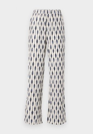 Pantaloni a gamba larga in un tessuto crema, caratterizzati da un motivo a goccia ripetitivo in blu navy. La vita elastica e la texture morbida aumentano il comfort.