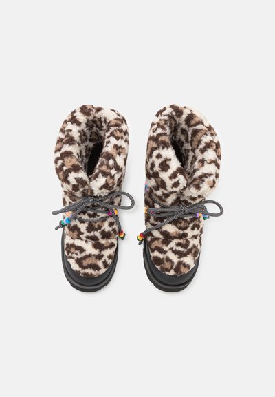 Leopard-patterned boots with brown and cream faux fur upper, black rubber sole, and multicolored laces. Cuffed design for comfort.
