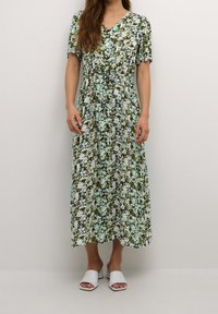 Blumenkleid in Grün, Blau und Weiß, mit kurzen Puffärmeln, einem V-Ausschnitt und einer Kordelzug-Taille für eine verstellbare Passform.