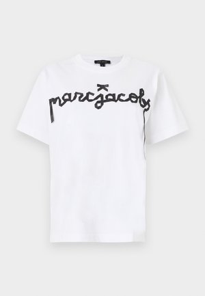 White short-sleeve T-shirt with black cursive-style text "marc jacobs" across the chest and a small black bow detail above the text.