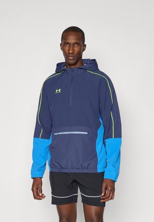 Navy and blue hooded jacket with neon green accents, half-zip front, and a front pocket. Lightweight fabric with elastic cuffs.