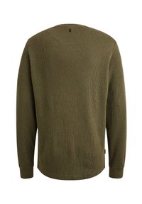 Chemise verte à manches longues, texture côtelée, encolure arrondie et manches à poignets. Présente un petit détail en boucle à l'arrière.