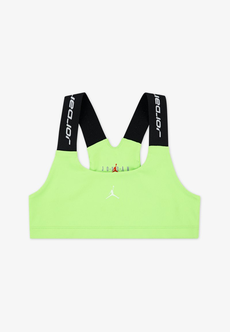 Neon zaļa sporta krūšturis ar melniem siksniņām. Priekšpusē ir balts Jumpman logo un uz siksniņām teksts "Jordan". Gluda tekstūra.