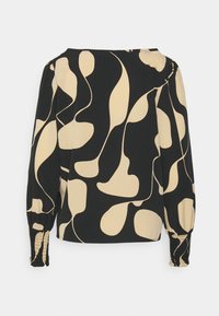 Blouse noire avec des formes organiques abstraites beiges, manches longues bouffantes et poignets élastiqués.