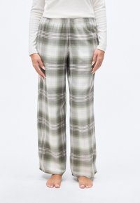 Παντελόνι πιτζάμας από βαμβάκι με καρό μοτίβο σε πράσινους, λευκούς και ροζ αποχρώσεις. Διαθέτει φαρδιά, άνετη γραμμή με ελαστική μέση.