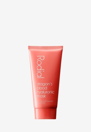 Coral tube of Rodial Dragon’s Blood Hyaluronic Mask with white text; features a smooth surface and a rounded cap, labeled for hydration.