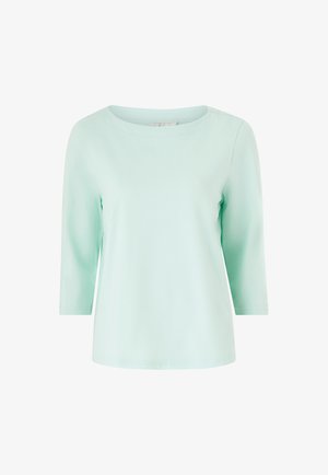 Mięta zielona, długi rękaw, bluzka z okrągłym dekoltem, wykonana z miękkiego materiału, charakteryzująca się luzem i prostym krojem bez wzorów i ozdób.