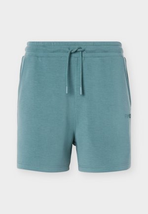 Türkiz színű, hétköznapi rövidnadrág rugalmas derékrésszel és húzózsinórral, oldalzsebekkel és finom márkajelzéssel a bal combon.