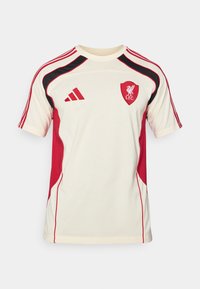 Cremefarvet sportsskjorte med røde og sorte detaljer, Adidas-logo og Liverpool Football Club emblem. Korte ærmer med tre-stribe detaljer.