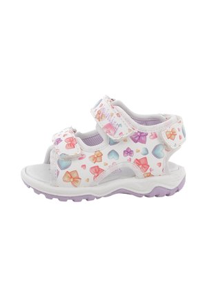 Sandalo bianco per bambini con suola viola, decorato con cuori multicolori e fiocchi, con fascette in velcro regolabili per una calzata sicura.