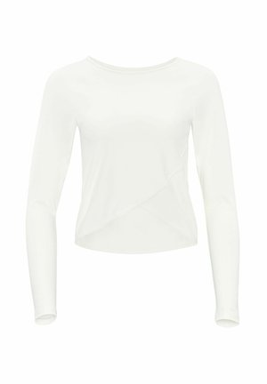 Top blanco de manga larga hecho de tela suave, con un diseño corto y dobladillo asimétrico con escote redondeado.