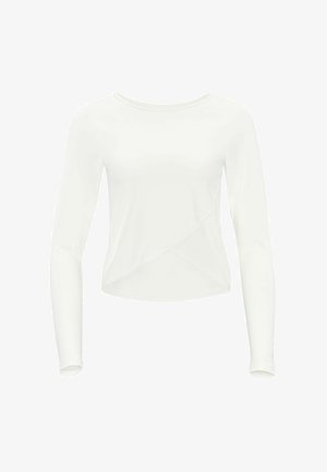 Bluza albă cu mâneci lungi, realizată dintr-un material neted, având un design cropped și o margine asimetrică, cu un decolteu rotund.