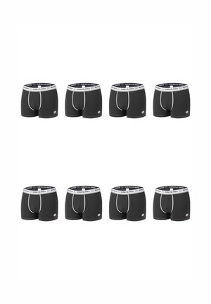 Boxers noirs avec une ceinture blanche arborant le logo "SERGE BLANCO". Le design comprend des coutures blanches contrastantes et une coupe ajustée.