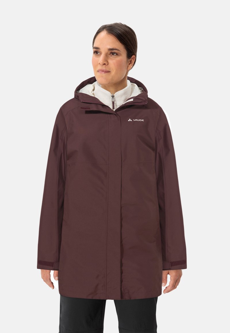 Bordeauxfarbene wasserdichte Jacke mit Kapuze, ausgestattet mit einem Frontreißverschluss und zwei Seitentaschen. Weiche Innenseite und Klettverschlussmanschetten für eine bessere Passform.