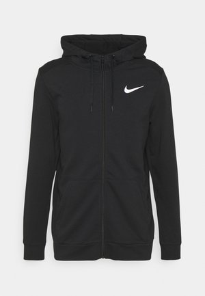 Zwarte rits hoodie van zachte stof, met een voorvak, verstelbare trekkoordkap en een wit Nike-logo op de borst.