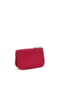 Red fabric pouch with a zip closure, featuring smooth texture and rounded shape. Simple design suitable for storing small items.