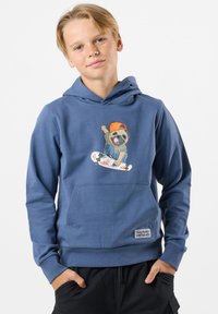 Felpa blu in cotone, con tasca frontale e un'illustrazione di un bulldog francese su uno skateboard. Include cappuccio con cordino.