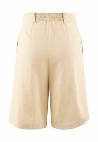 Beige linned-shorts med en afslappet pasform. Har en elastisk talje og sidelommer. Glat tekstur og længde til midt på låret.
