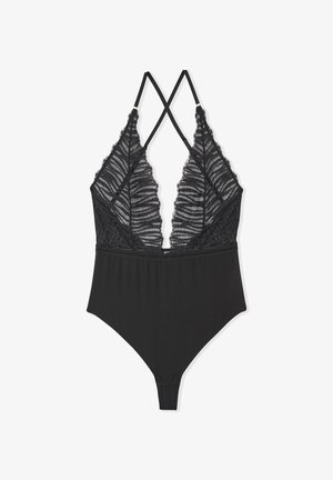 Black bodysuit featuring lace trim and sheer details, with a V-neck and crisscross straps. Smooth fabric with a fitted silhouette.