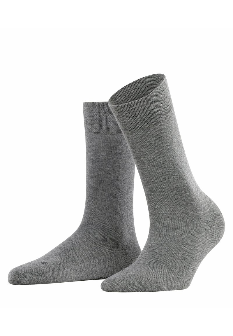 Chaussettes en coton grises avec un design côtelé, de longueur mi-mollet et d'une texture lisse. Pas de motifs ou de détails de quincaillerie notables.