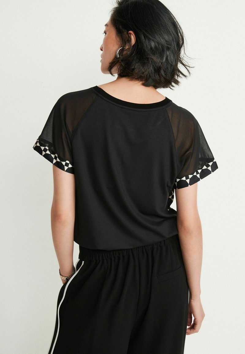 Damen T-Shirts | Next SHORT SLEEVE T-Shirt print black/schwarz - WH78842 Damen T-Shirts | Next SHORT SLEEVE T-Shirt print black/schwarz - WH78842