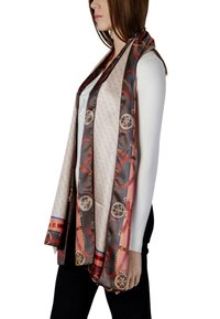 Sciarpa di seta marrone con motivo geometrico di cerchi e catene, accentuata da strisce rosse e blu. Tessuto leggero e morbido.