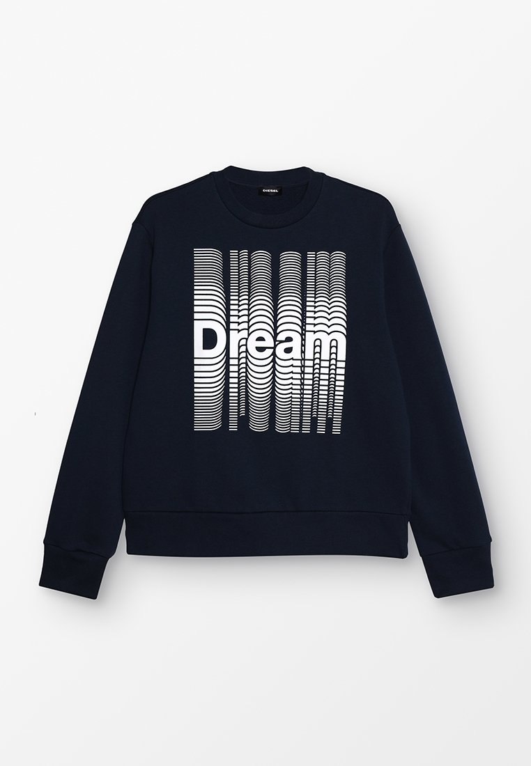 Sweat-shirt à manches longues bleu marine avec texte stylisé "Dream" en blanc, présentant un motif de vagues verticales superposées sur le devant.