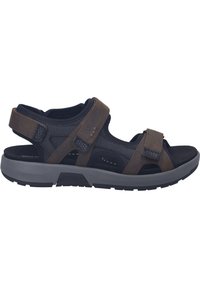 Åben sort og brun sandal med justerbare Velcro-remme og en polstret, tyk grå sål for komfort ved udendørs gang.