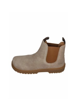 Beige suede Chelsea boot with brown elastic side panels, pull tabs on front and back, and a rubber sole.