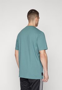 adidas Performance FC BAYERN M�NCHEN SZN TEE - T-shirt basic - hazy emerald