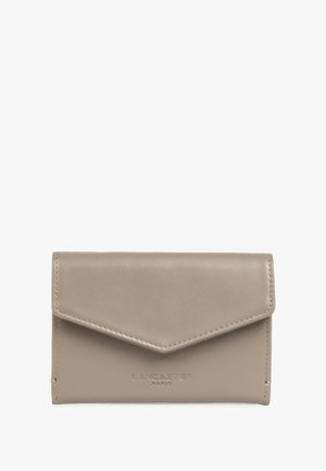 Beige leather wallet with a flap closure. Features embossed brand name "Lancaster Paris" and neat stitching along the edges.