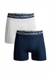 Dva para prilegajočih bokseric: ene bele in ene mornarsko modre, z debelim elastičnim pasom z belim logotipom "MUCHACHOMALO".