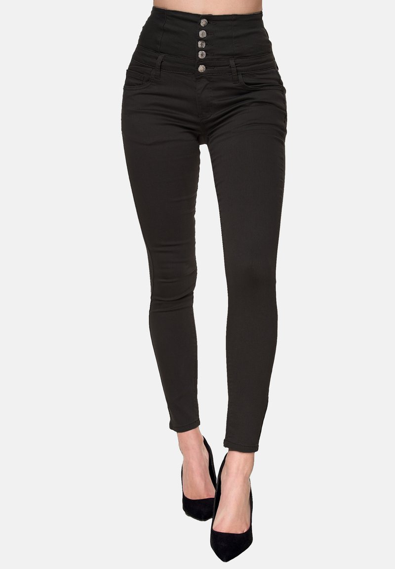 Leggings neri a vita alta con design aderente, caratterizzati da cinque bottoni d'argento, tasche frontali e una texture liscia.