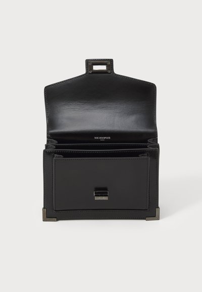 Black leather handbag with an angular design. Features a top handle, multiple compartments, a front pocket, and metallic accents.