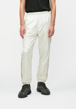 Tepláky - lapland/lionne